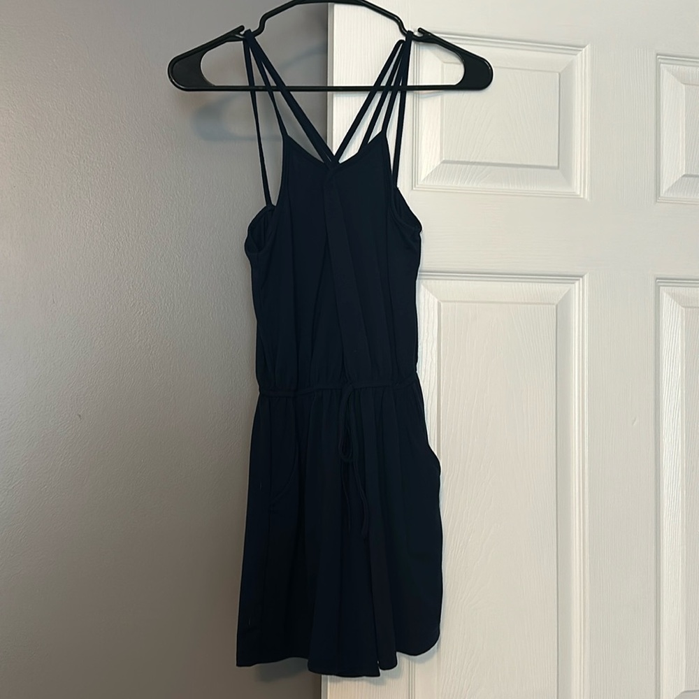 Cute little blue romper never worn with pockets